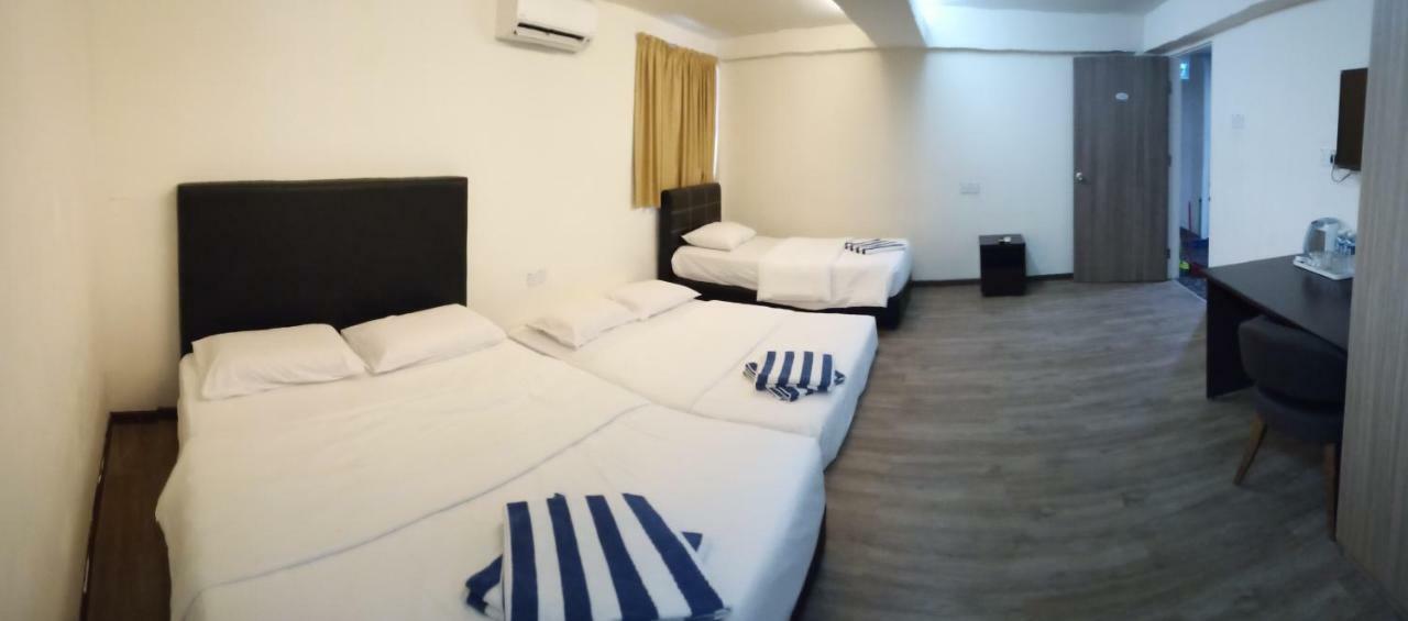 Hotel Truly Asia Кота-Кинабалу Экстерьер фото
